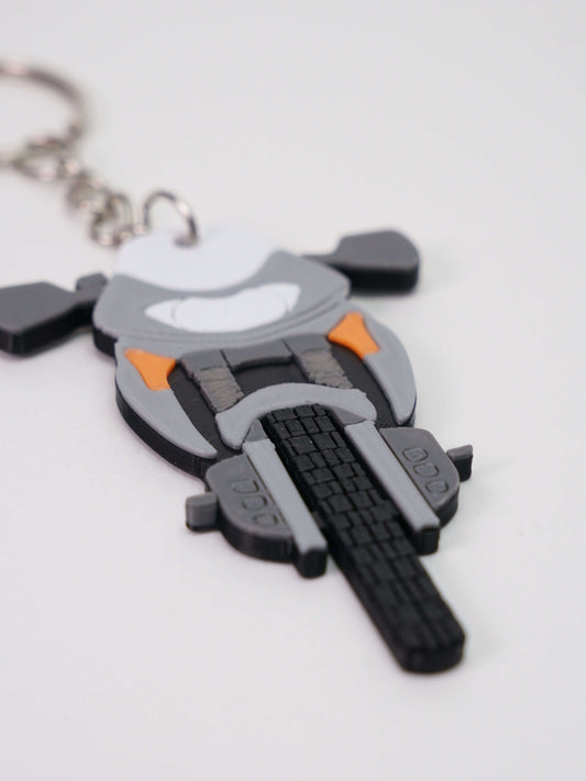 Κοντινό πλάνο του 3D printed μπρελόκ Honda Transalp 650 πάνω σε λευκό φόντο